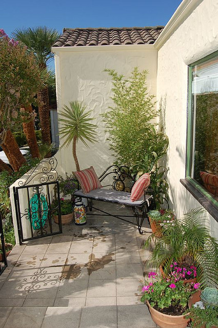 Un petit jardin ou une cour, des lieux propices à l’installation d’une pompe à chaleur (Source : Flickr - Kendyl Young) 